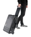 Peli 1510 case being pulled like a trolley suitcase.